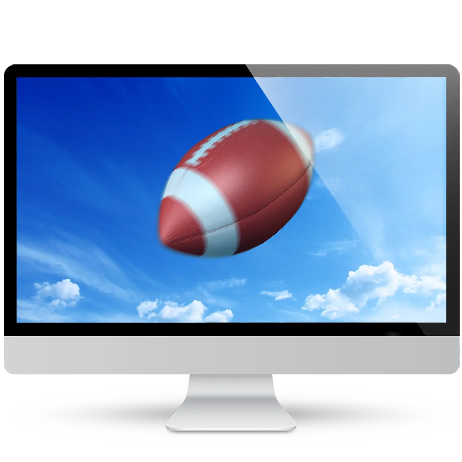 Desktop monitor showing a wallpaper of an American football spinning through a bright blue sky with white clouds.