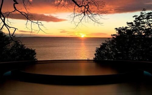 Luxury Peace: 4K Ocean Sunset Wallpaper | OHMYicons
