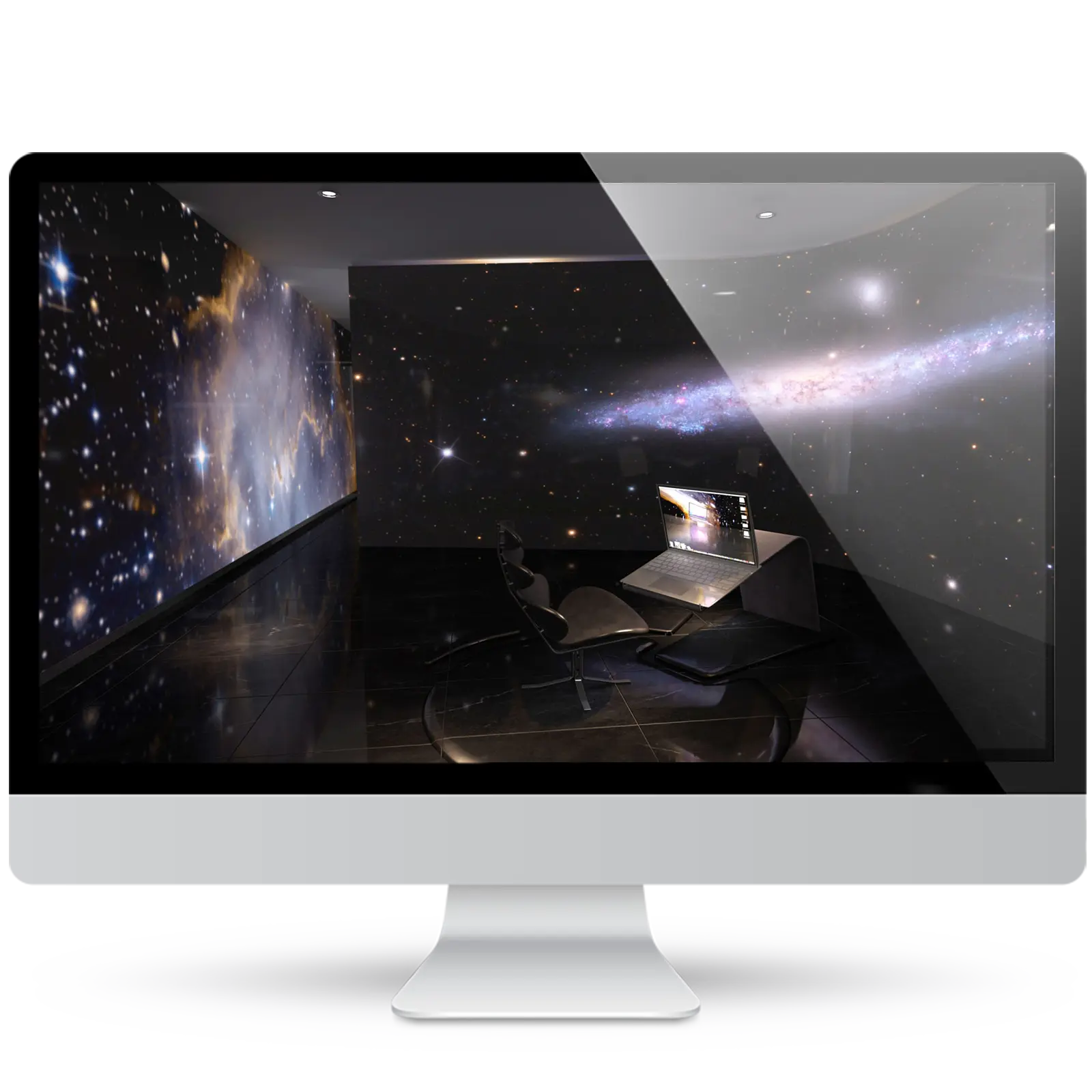 Desktop monitor showing a space-themed wallpaper: a dark modern room with walls of stars, nebulae and a galaxy, a lounge chair and a laptop on a sleek desk.